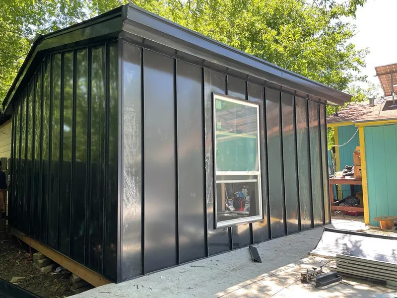 Black standing seam metal wall panels for Metal Roof Installation in Lihue